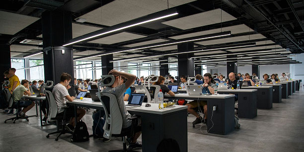 large office warehouse building with many desks